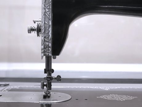 Detail view of an old-fashioned sewing machine