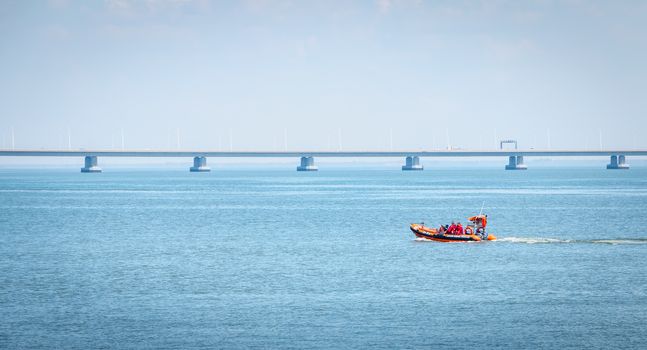 Lisbon, Portugal - May 7, 2018 - Rescue boat sailing on the Tagus River on a spring day