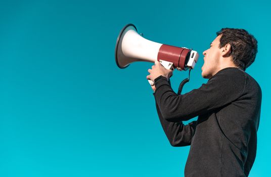 megaphone as a tool for loud communication of important news and information.