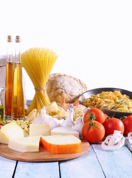 Healthy ingredients on the kitchen table on white background.