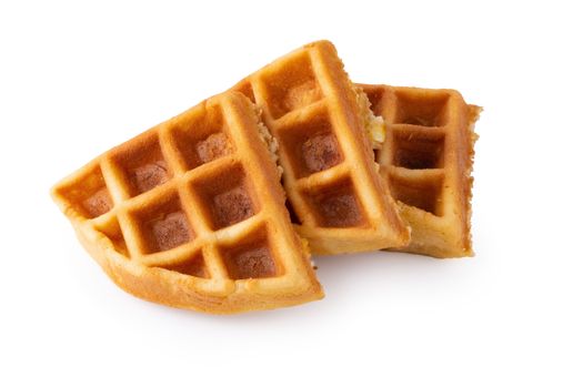 Freshly baked waffles isolated on white background.