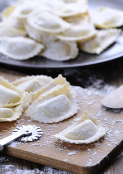 Preparing fresh ravioli at the kitchen table.