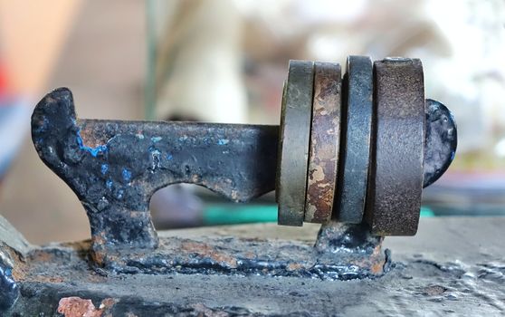 Vintage corroded weights of an old trading scale