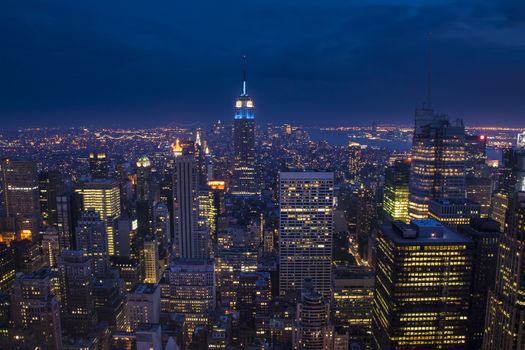 New York City with skyscrapers in the blue hour. The amazing Big Apple in USA.