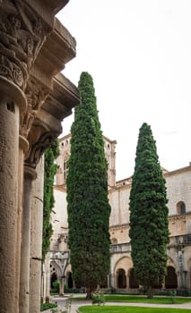 Detail of the cloister of Santa Maria de Poblet Monastery, Unesco heritage. Romanesque cloister architecture in Poblet, Spain.The Poblet monastery is declared a UNESCO World Heritage Site ref. 518rev