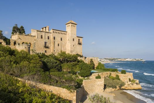 The famous castle of Tamarit an aristocratic house placed over a cliff in the mediterranean coast of Tarragona, Spain
