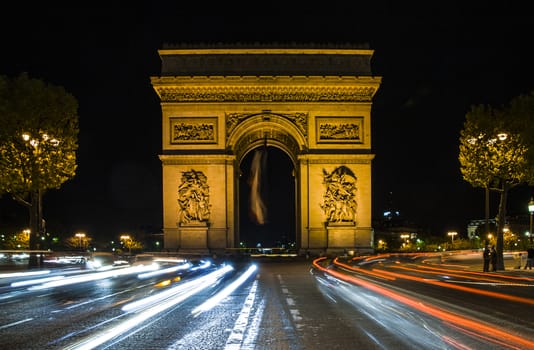 Arc de Triomphe in Paris, France. Night scene
