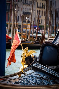 Detail of typical venitian gondola on water. Italy