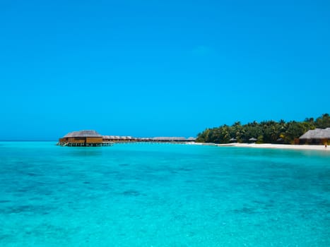 Beautiful beach with water bungalows or water villas at Maldives