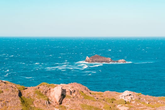 The wind beaten and dry rocky landscape of the Cape in Cap de Creus peninsula, Catalonia, Spain. This extraordinary landscape inspired some Salvador Dali works.