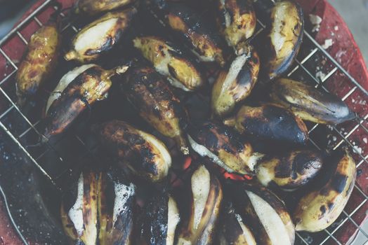 Roasted or Grilled Banana for sale at Thai street food market or restaurant in Thailand