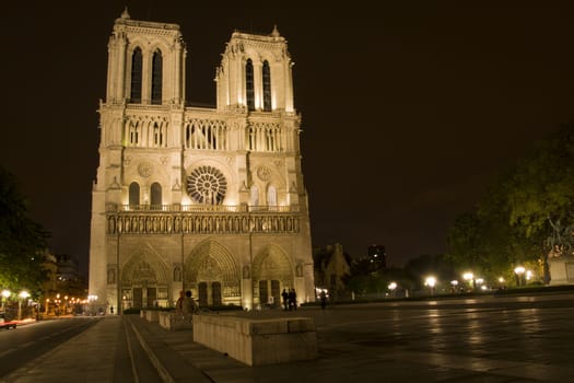 Quiet night scene of Notre Dame cathedral in Paris.