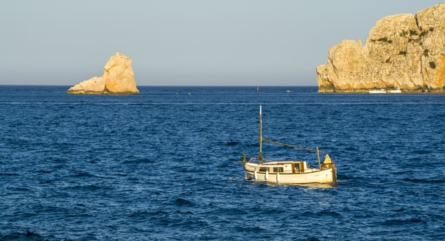 Fisherman's boat in Medes islands, mediterranean sea. Located just a mile off the coast in front of Estartit beach, The Medes Islands archipelago is a Natural park. Spanish mediterranean Costa Brava.