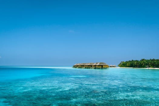 Beautiful tropical Maldives resort hotel and island with beach and sea on sky for holiday vacation