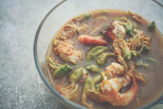 Hot and Sour Katuri Flower Soup for sale at Thai street food market or restaurant in Thailand