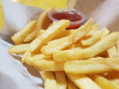 French fries or chips (potato) is a side dish or snack in fastfood restaurant, unhealthy food or fat concept