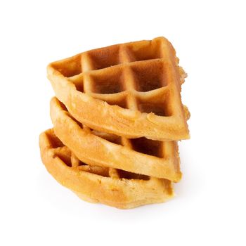 Freshly baked waffles isolated on white background.