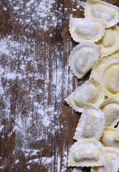 Preparing fresh ravioli at the kitchen table.