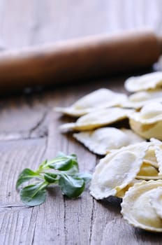 Preparing fresh ravioli at the kitchen table.