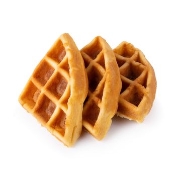 Freshly baked waffles isolated on white background.