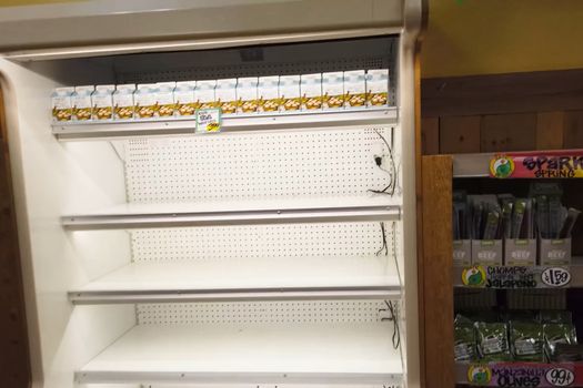 New York, USA - April 2, 2020: Empty shelves with groceries in supermarkets because of the panic from the coronavirus.