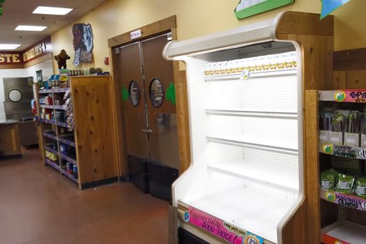 New York, USA - April 2, 2020: Empty shelves with groceries in supermarkets because of the panic from the coronavirus.