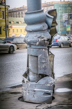 Streetlight post destroyed by a car accident in a street of Moscow, Russia