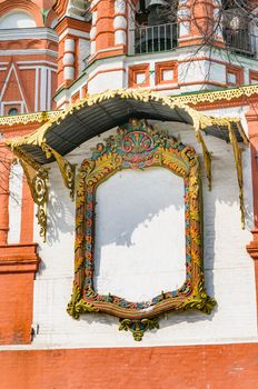 Detail of a huge frame with angels on the Saint Basil's Cathedral in Moscow, Russia