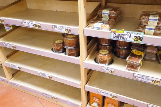 New York, USA - April 2, 2020: Empty shelves with groceries in supermarkets because of the panic from the coronavirus.