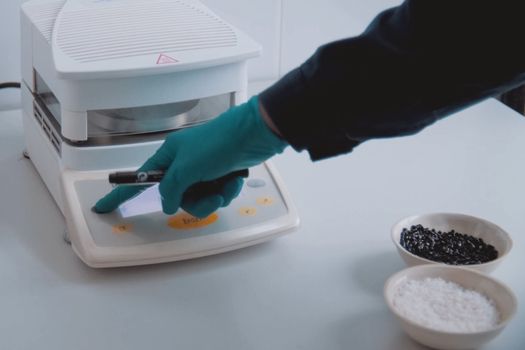 Weighing the components of the explosive on electronic scales.