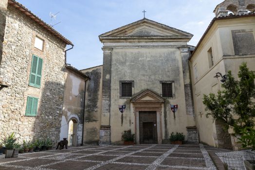 san gemini, italy june 13 2020: atrium inside the village with church and medieval youth hostel