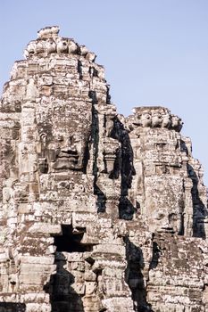 Two towers with Buddhist faces carved on them. Bayon Temple, Angkor Thom, Siem Reap, Cambodia