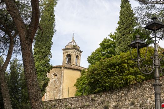 San Gemini, Italy June 13 2020: Bell tower of Santo Gemini in the town of San Gemini medieval age