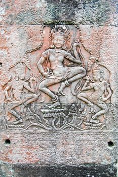 Apsara dancer goddesses carved on a pillar of the Ancient Khmer temple of Bayon, Angkor Thom, Siem Reap, Cambodia.