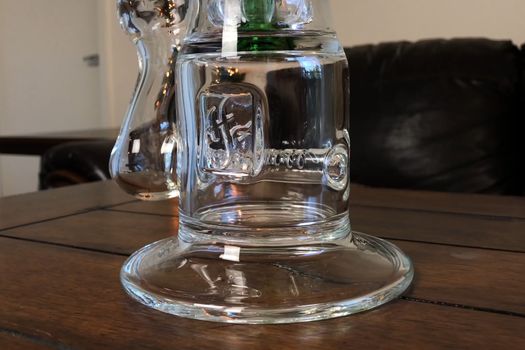 Glass bong for smoking a marijuana and other vegetable smoking mixtures.