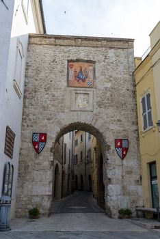 San Gemini, Italy June 13 2020: door on the central square of the town of San Gemini with coats of arms of the district