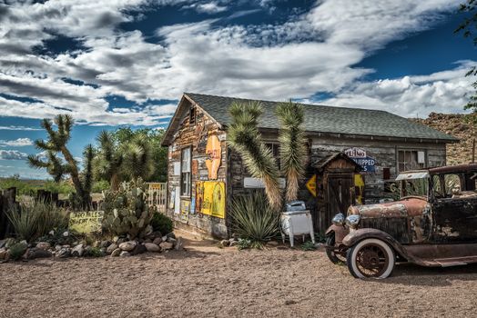 HACKBERRY, ARIZONA, USA - MAY 19, 2016 : Old car wreck left abandoned at the Hackberry General Store. Hackberry General Store is a famous stop on the historic Route 66.