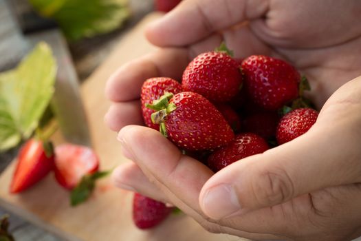 Strawberry In a bowl On a Wooden Background.