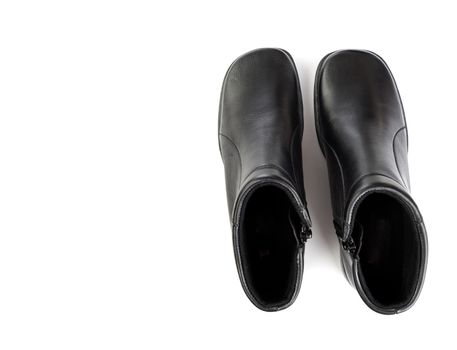Black boot leather shoes isolated on white background