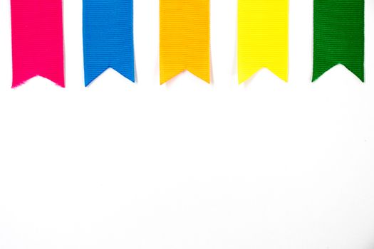 Colorful ribbon (Pink, blue, orange, yellow, green) on white background