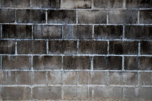 Black stain on white brick concrete wall background