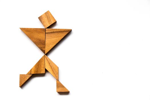 Wooden tangram as happy man shape on white background (Concept as business has success)