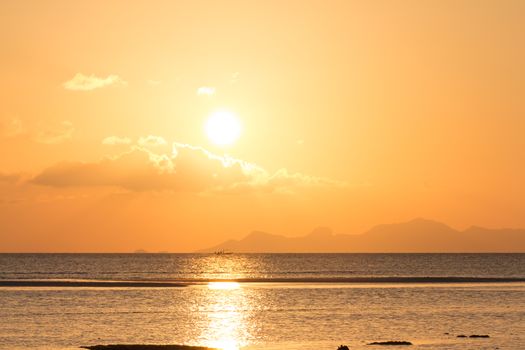 Golden orange sunset tropical sea background