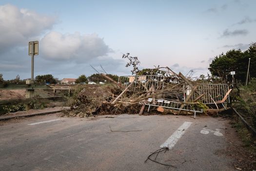 Bretignolles sur Mer, France - October 9, 2019: Barricade of wood, stone and mobile barrier on a ZAD (Acronym of Zone to Defend) protest zone against the construction of the boat harbor