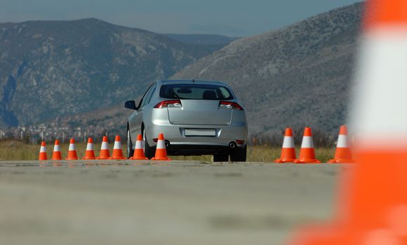 car on the test tracks with cones