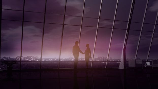 In the evening, a businessman and a businesswoman shake hands in an office with panoramic windows.