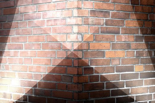 Aged and weathered brick wall textures with bright spotlight illumination