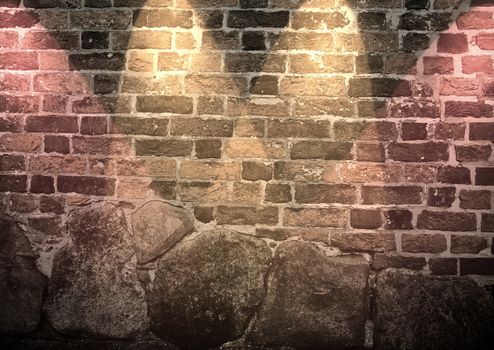 Aged and weathered brick wall textures with bright spotlight illumination