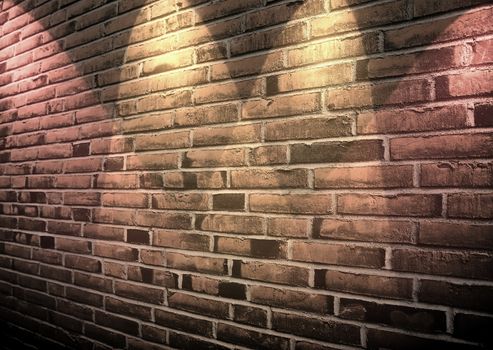 Aged and weathered brick wall textures with bright spotlight illumination