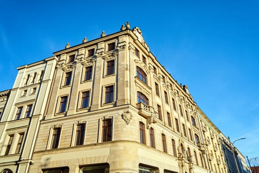 Facades with balconies of historic tenement houses in the city of Poznan